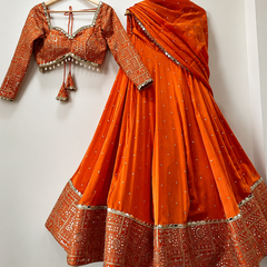 Embroidered Semi Stitched Lehenga Choli (Orange)